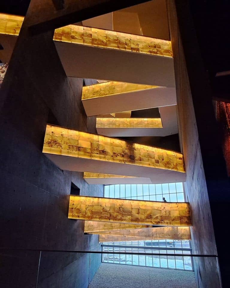 The CMHR in Winnipeg has visitors start in the dark and follow a path of light up and into the daylight
