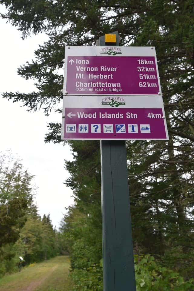 Distance and directional signage along the Confederation Trail in Prince Edward Island helps hikers and cyclists avoid getting lost and make decisions about how far to venture.