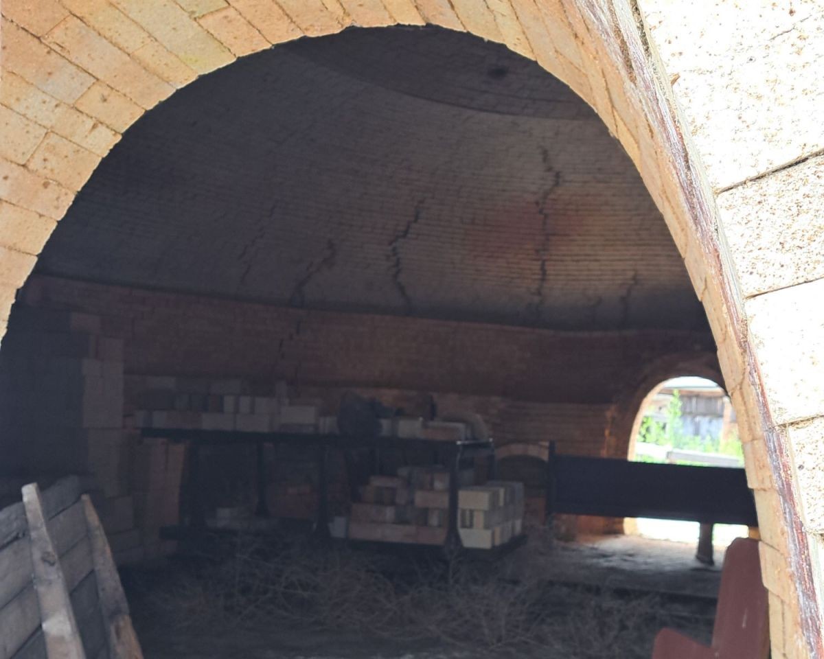 Claybank Brick Plant has 10 round kilns that were used during the brick making process. The inside of this kiln still has a pile of bricks in it.