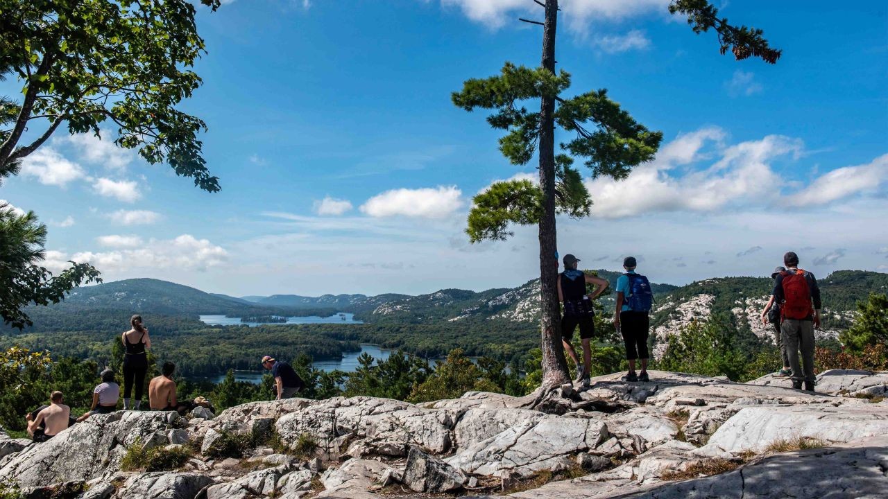 Enjoying mountain views from the summit of the Crack Hiking Trail in Ontario Canada.