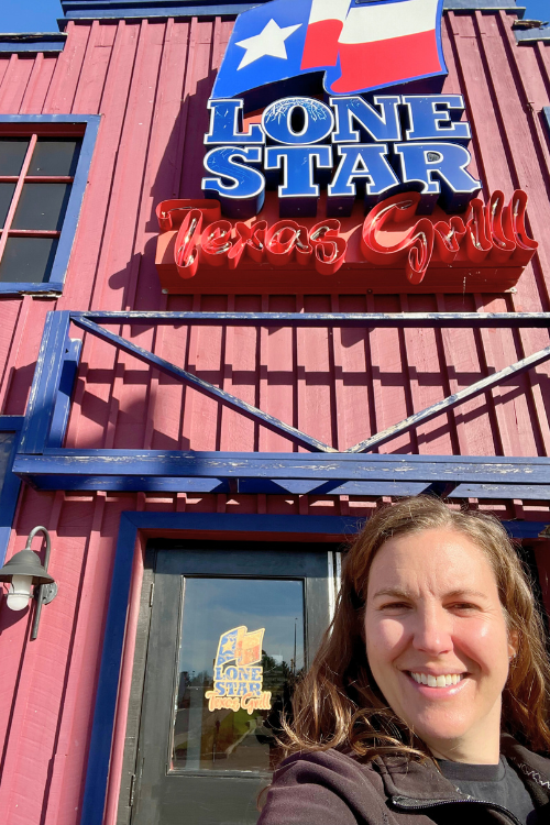 Picture of me, Anja Cahill, outside the Lone Star Texas Grill restaurant in Kanata, Ontario.