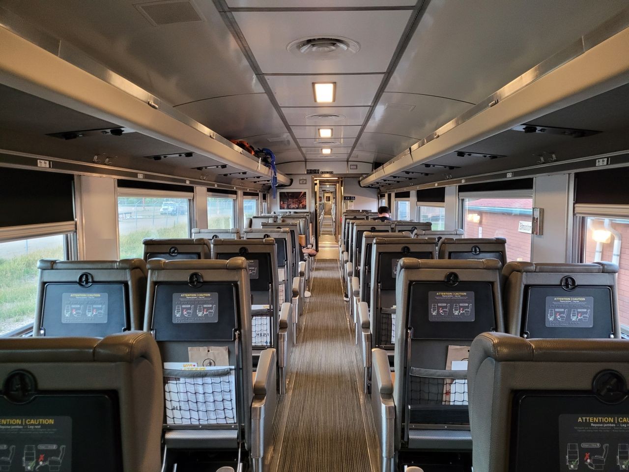 Passengers in Economy Class on board Via Rail's The Canadian can relax in comfortable seats with lots of leg room.