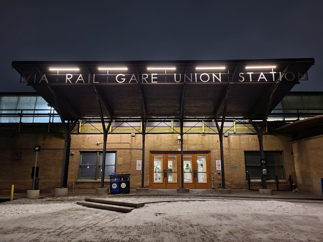 Passengers have a chance to disembark and explore The Forks outside the Via Rail's station in Winnipeg, Manitoba.