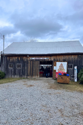 The entrance to a holiday barn, sign above says 