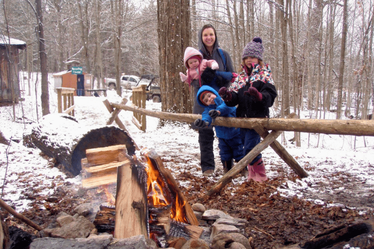 Outdoor fire in the woods at Little Cataraqui Conservation Area outside of Kingston, Ontario.