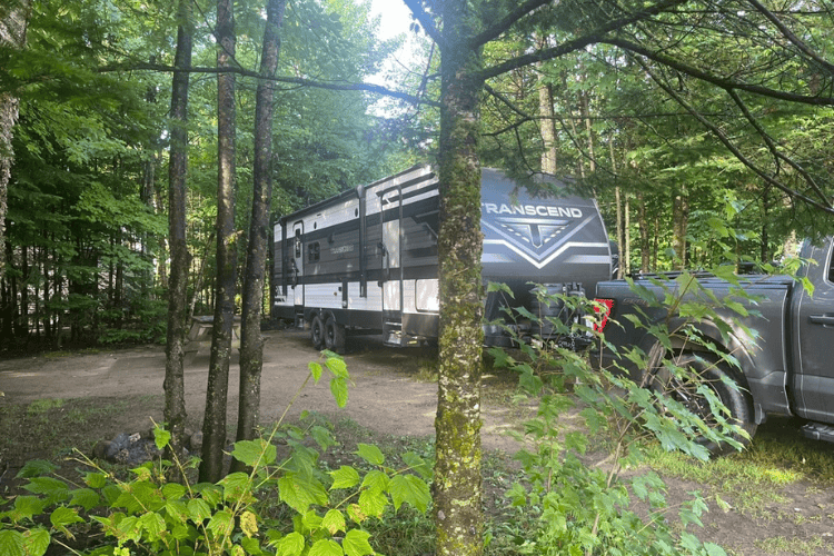 Camping trailer in the woods at Val Cartier, Quebec, Canada