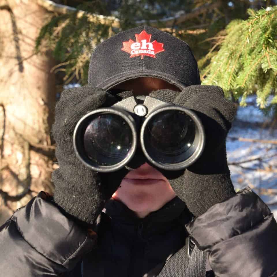 Birdwatching in Canada with eh Canada head gear.