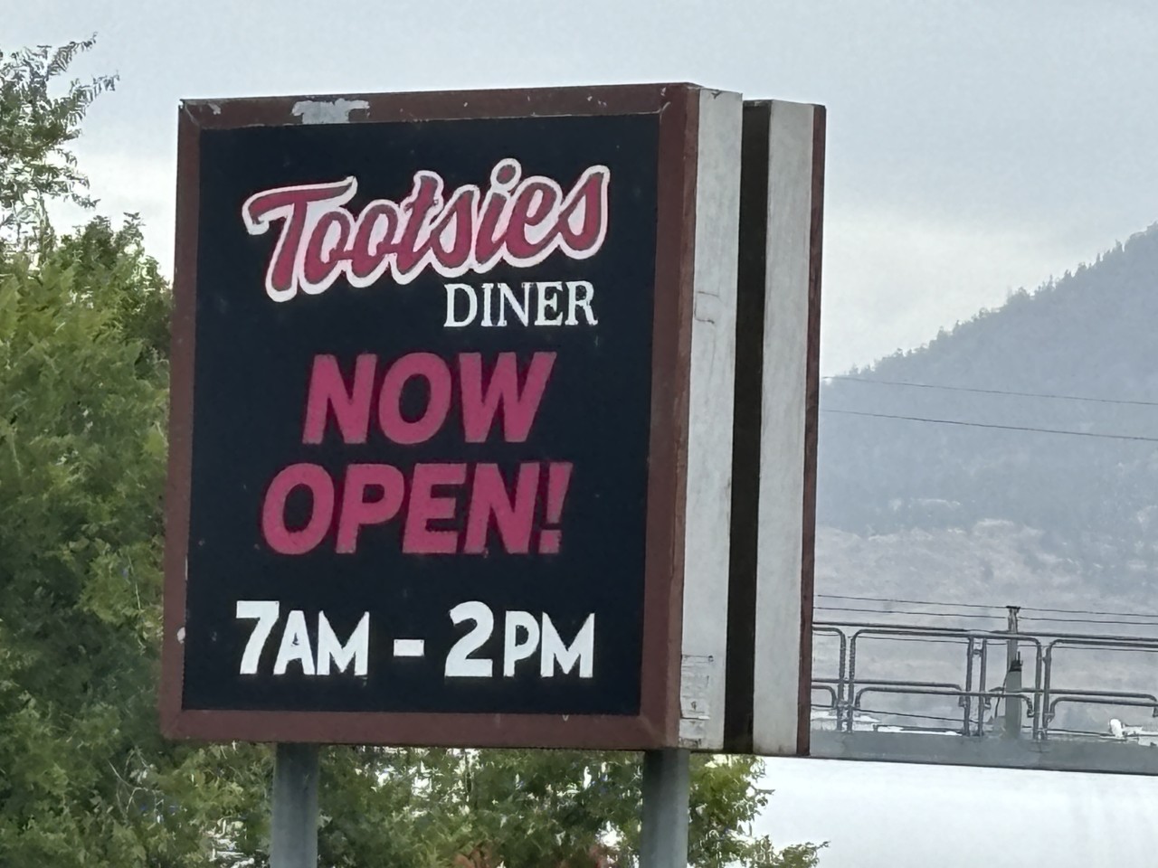 Signage for Tootsies Diner in Penticton British Columbia 2024-09-25 - Sign welcoming you to Tootsies Diner. Note the hours 7am to 2pm from Monday to Friday. 