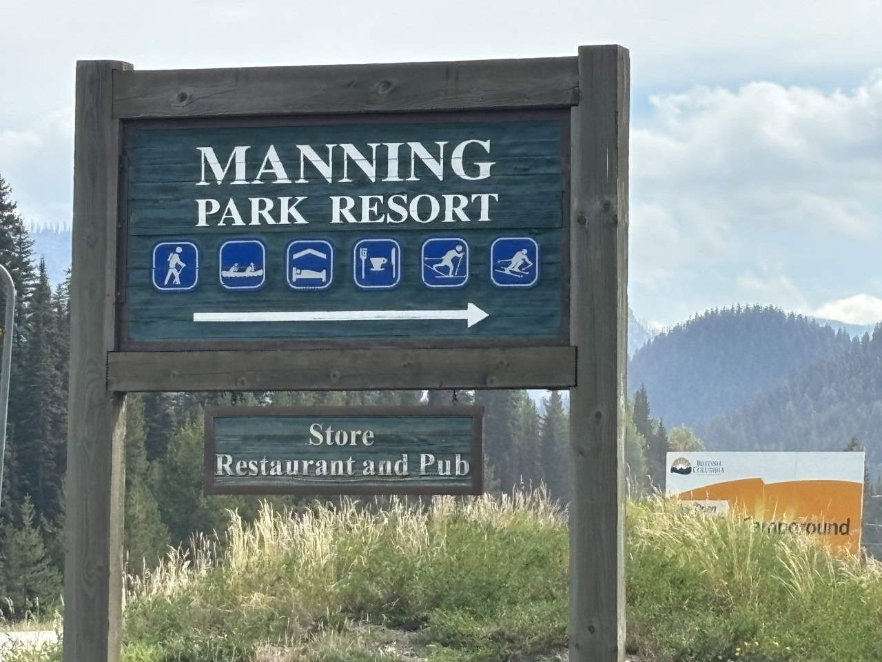 Large sign for Manning Park Resort 2024-09-29 - As you travel east on Hwy 3 from Hope, you can't miss the large sign advertising the Manning Park Resort. A great place to stop on a road trip. An even better place to come for a vacation, at any time of the year.