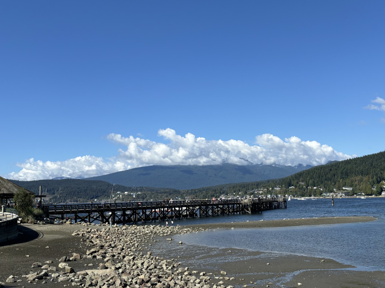 Rocky Point Park Pier in Port Moody British Columbia 2024-10-21 - The tide is out and the pier is stretching out into the water. 