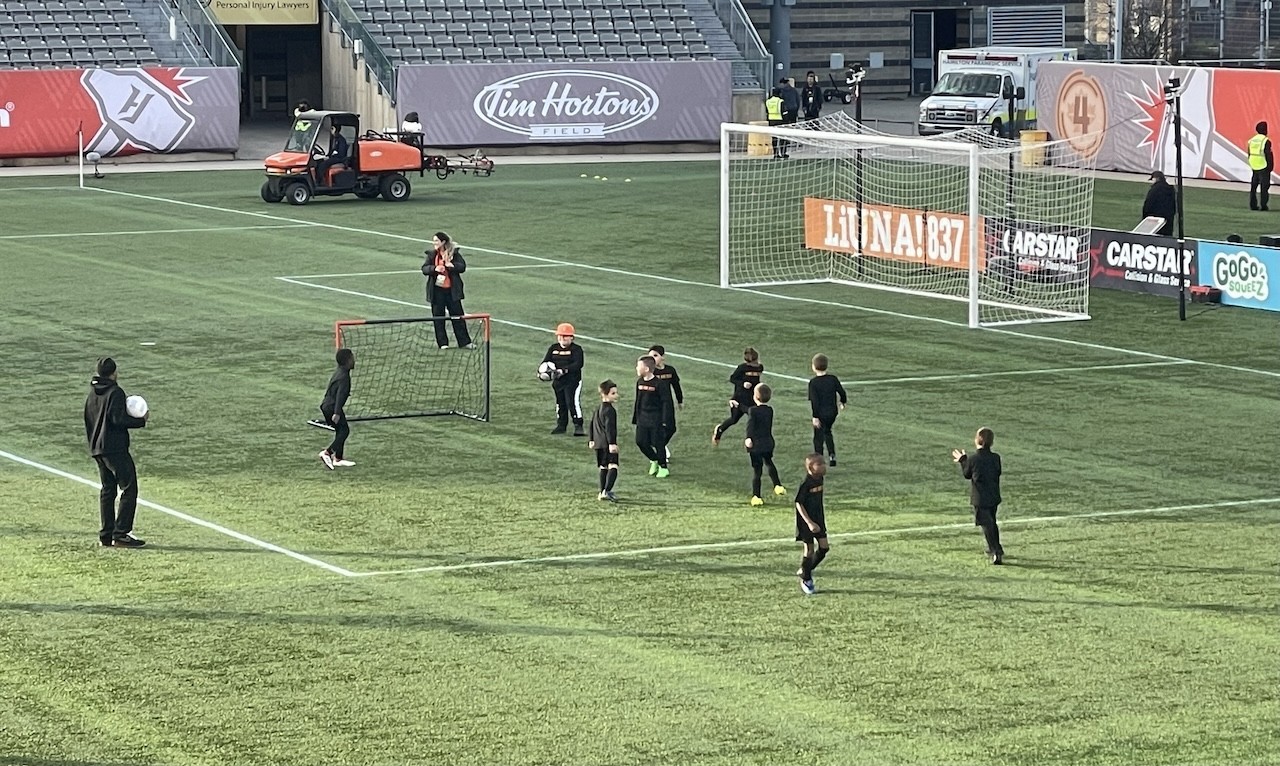 Youth Game at the Forge FC Game in Hamilton Ontario - At the halftime, youth from a minor league played a game on one part of the field at Tim Hortons Field in Hamilton, Ontario, Canada.