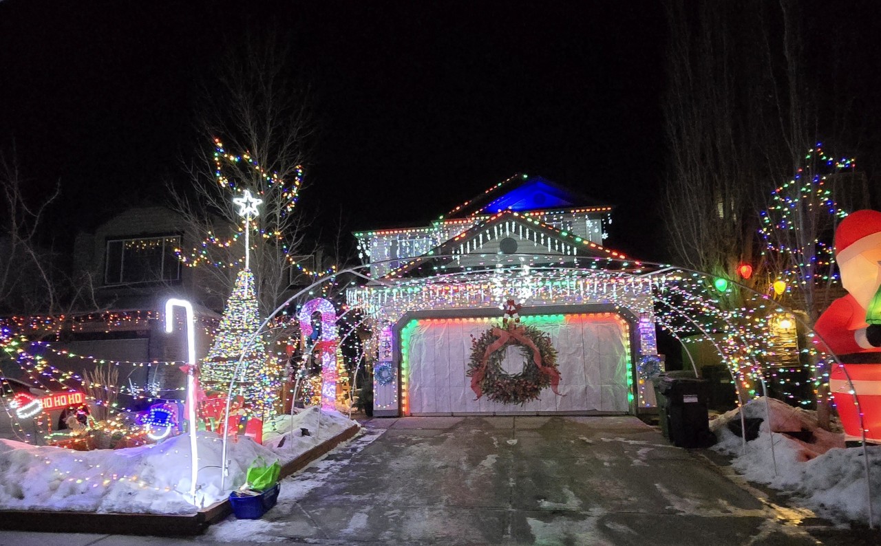 Highlight of Candy Cane Lane - Definitely the most done up house along Candy Cane Lane (aka Tuscany Vista Point). I really enjoyed the rainbow lights into their garage! Would be a fun welcome home every day.