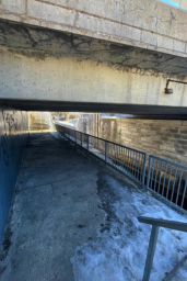 Underpass to follow along the lock under the roadway