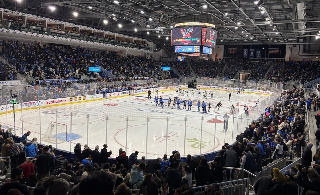 Toronto Sceptres PWHL National Anthems Toronto Ontario Canada  - The PWHL players were all paired with local girls hockey players for the start of the game. The little players lined up with the big players for the singing of the national anthems.