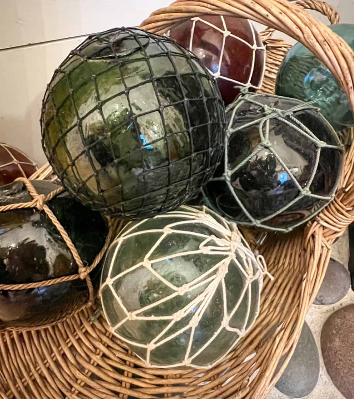 Cora Lee Rennie - Glass fishing balls used as decor in the hut