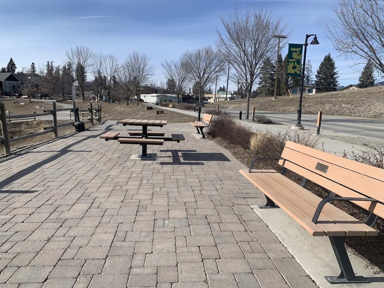 Picnic Tables and Seating at Pothole Park  - Along the walkway, visitors have access to ample seating choices at Pothole Park in Invermere, British Columbia.